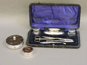 A silver part manicure set, and tortoiseshell boxes