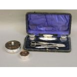 A silver part manicure set, and tortoiseshell boxes