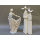 Two Lladro figures, a lady dancer, 31cm, and two nuns, 33.3cm