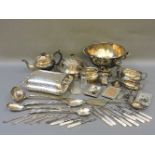 A silver candlestick, a silver plated punch bowl, and other items of silver and plate