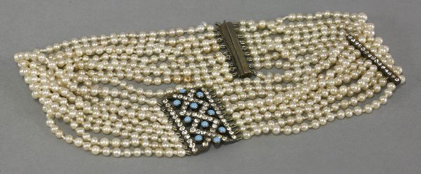 A silver simulated pearl and paste choker or dog collar, circa 1915, with a lattice centrepiece, set