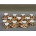 Twelve Royal Crown Derby coffee cans, and nine saucers