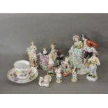 A Capodimonte porcelain figure group of a couple with sheep, further figures, and a Dresden cup
