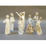 Seven assorted Lladro figures of young children, three in night gowns, 'Sunday's Child', two