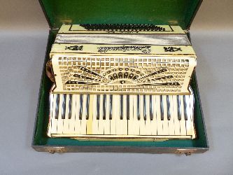 A Guici Amelli accordion, cased