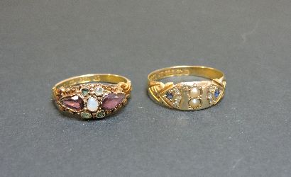 A Victorian 15ct gold sapphire, diamond and seed pearl ring, and a Victorian 9ct gold garnet and