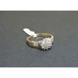 A 9ct gold diamond cluster ring, with an estimated total diamond weight of approximately 0.50ct