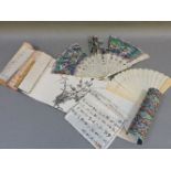 A Chinese ivory fan, with painted paper leaves, poor condition, nine plain ivory fans, and a Chinese