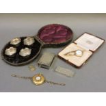 Four cased silver salts, a match box holder, a silver snuff box, and three watches