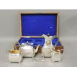 A silver plated four piece teaset, by Elkington & Co, numbered 16637, in a fitted oak case