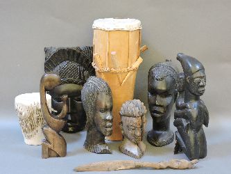 A collection of African tribal figures and busts