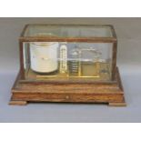 An oak cased barograph, with thermometer and drawer for paper scales