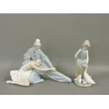 Two Lladro figures, one of a girl feeding geese, and one of ballet dancers, one foot missing, 23cm