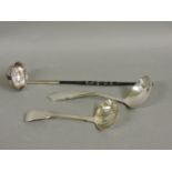 A white metal toddy ladle, with whale bone handle, 24cm long, a silver sifter spoon, London 1828,
