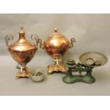 Two copper and brass samovars, and a set of old kitchen scales and weights