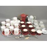 A Susie Cooper part teaset, a Carlton Ware rouge teaset, and a Japanese coffee set