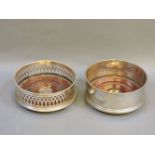Two modern silver wine coasters