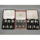 Three cased sets of silver coffee spoons, Sheffield 1939 and Edinburgh 1975