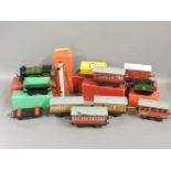 A collection of Hornby 'O' gauge, a no 51 loco and tender, both boxed, three passenger coaches, no 1