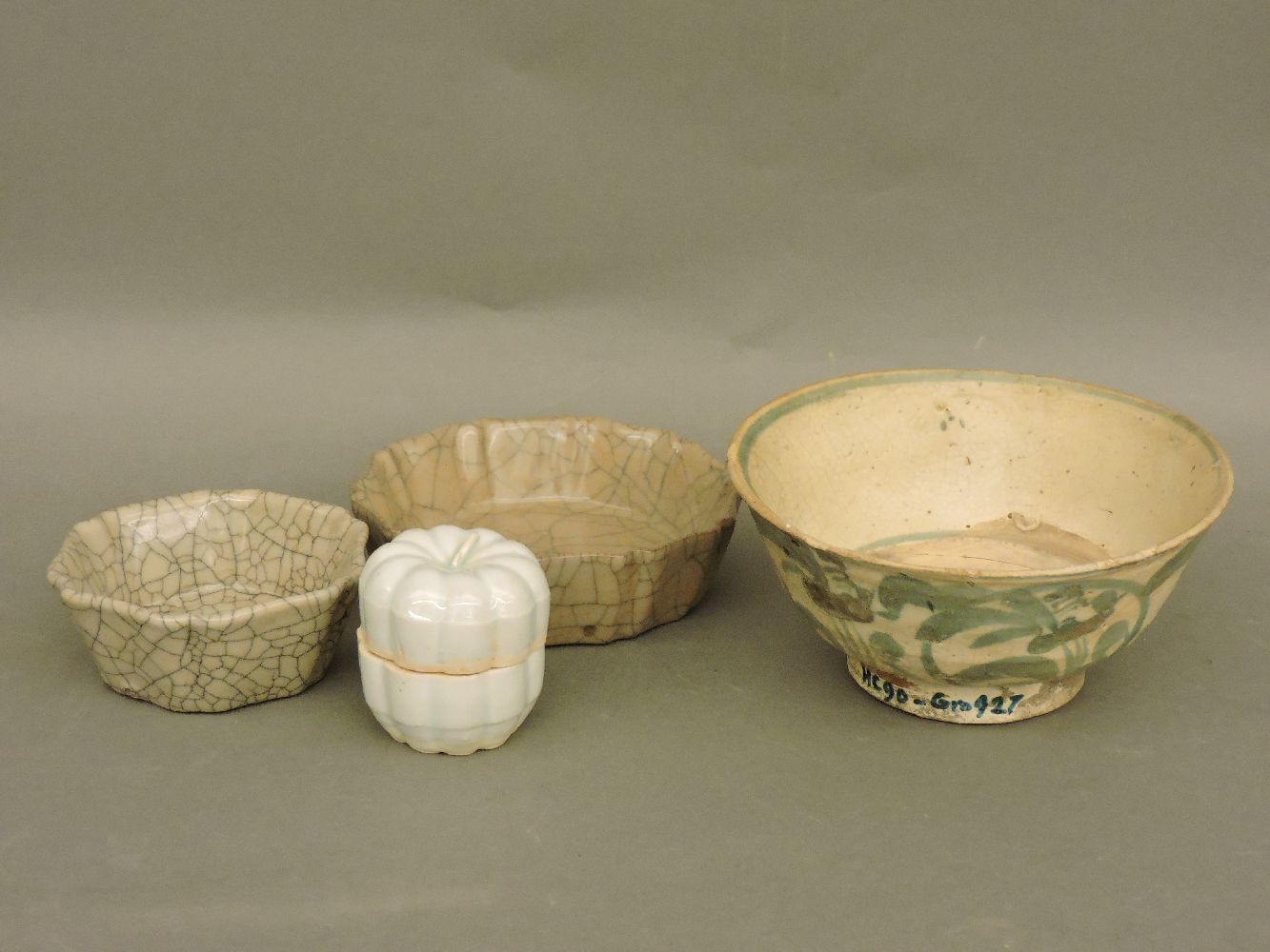 Three ancient crackle glaze pottery wares, and a lidded pot