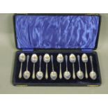 A cased set of twelve silver coffee spoons, Birmingham 1927
