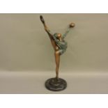 A reproduction bronze figure of a ballerina, the base signed Collett