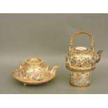 A small Satsuma teapot, and another, both damaged