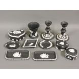 Eleven pieces of black jasper ware, and a pair of candlesticks