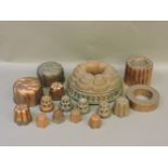 Five Victorian copper jelly moulds, and eleven smaller moulds, impressed LW and numbered 142