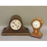 An Edwardian mantel clock, a 1930s two train mantel clock, Victorian and later wash jugs and