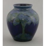 A Moorcroft 'Moonlit Blue' vase,impressed marks and numbered 189, green signature,10cm high