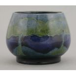 A Moorcroft 'Moonlit Blue' squat vase,impressed 'Moorcroft', 6.8cm high