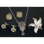 A Jugendstil amethyst and paste necklace,with a centrepiece composed of hammered cloud shapes, rub