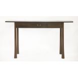 A hall table,by Robert Beal, with a single frieze drawer, on turned, flared supports,164cm