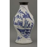 A blue and white Vase,Kangxi (1662-1722), of baluster form, painted with panels in the shape of