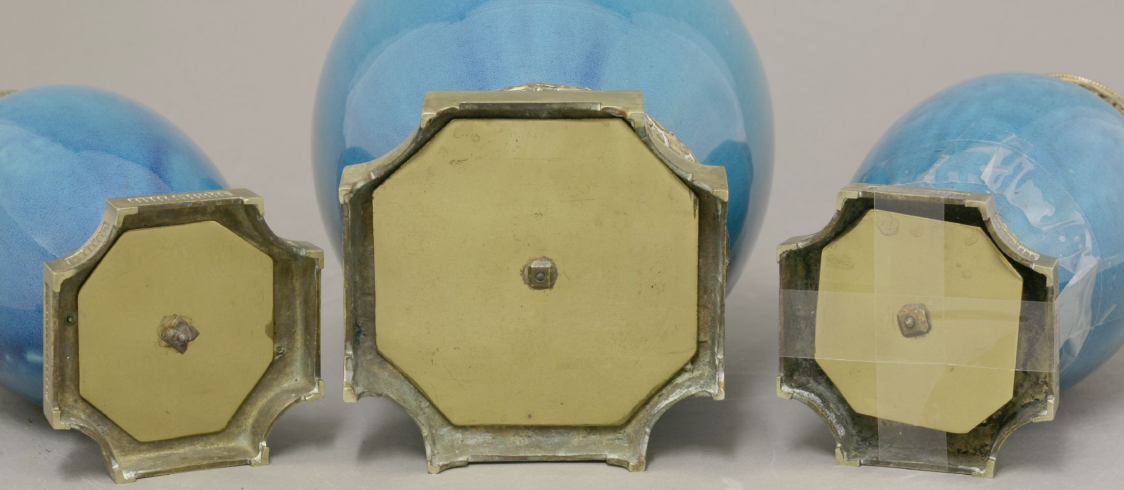 A garniture of three Vases, c.1900, the ovoid body under a turquoise glaze with gilt metal mounts, - Image 3 of 4