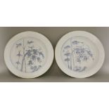 A pair of large Dishes,Yongzheng (1723-1732), each pencilled in underglaze blue with tree rats