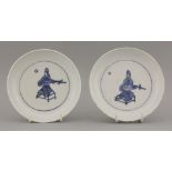 A rare pair of late Ming blue and white Dishes,Chongzhen (1628-1644), each with a musician seated on