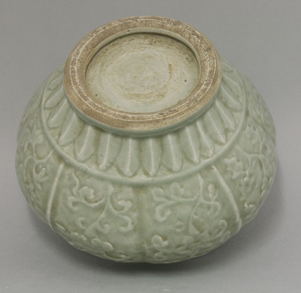 A celadon Guan and Cover,16th century or later, the lobed body moulded with floral sprigs beneath - Image 3 of 3