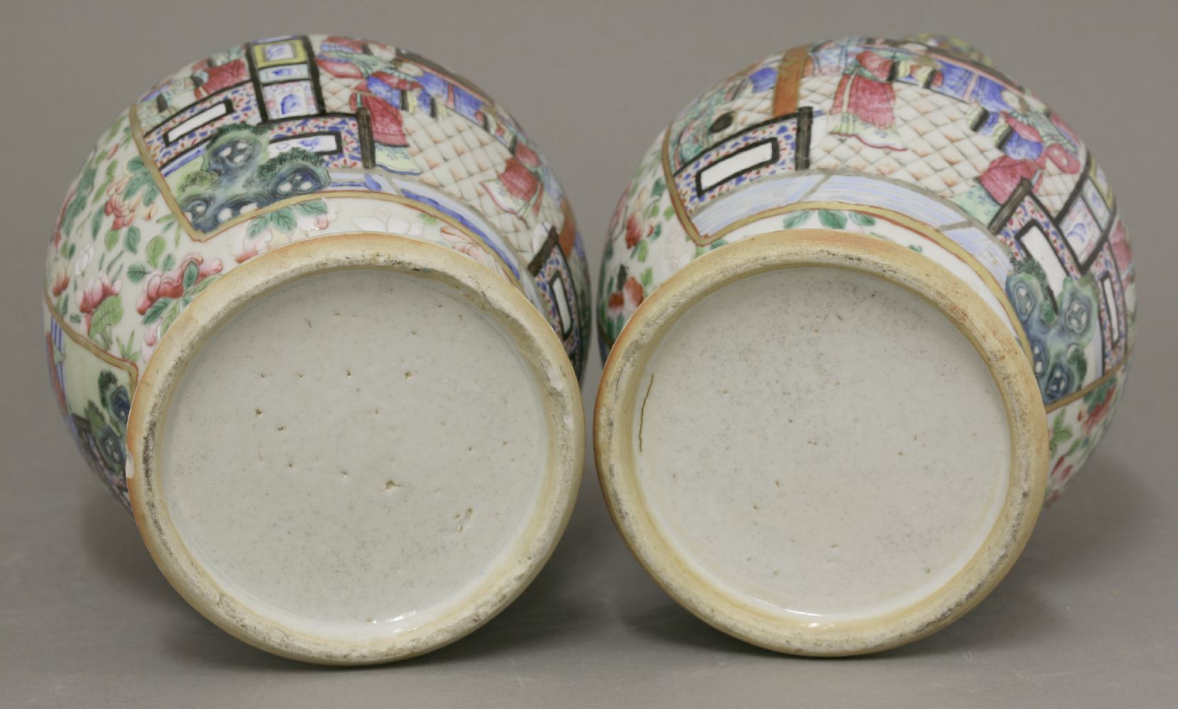 A pair of famille rose Vases,c.1880, typically enamelled with panels of a figure feasting with - Image 4 of 4