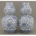 A pair of blue and white double gourd Vases,second half of the 19th century, each boldly painted