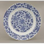 A blue and white Plate,Kangxi (1662-1722), well painted with peonies, leaves and buds, minor
