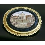 A Victorian micromosaic gold brooch,depicting St. Peter's Square, The Vatican.  An oval black