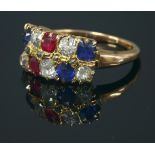 A ruby, diamond and sapphire two row ring, c.1900,with two graduated rows of old European cut