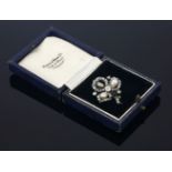 A late Victorian diamond and pearl leaf brooch, c.1890,in a later box by Mappin and Webb.  The