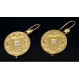A pair of Victorian gold and diamond shield form drop earrings,with an old European cut diamond,