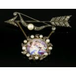 A Victorian diamond and pearl cupid's bow and arrow brooch,with enamelled plaque pendant below.  The