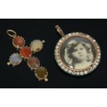 A Regency gold agate cross,with a series of oval cabochon agate specimens, each one claw set to a