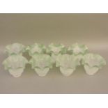 Seven Victorian style moulded and clear and green glass shades