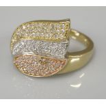 A 9ct three colour gold pavé set leaf spray ring